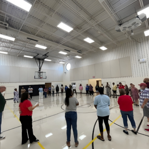 Oakmont Elementary teachers and staff gather for a schoolwide restorative circle in the gymnasium